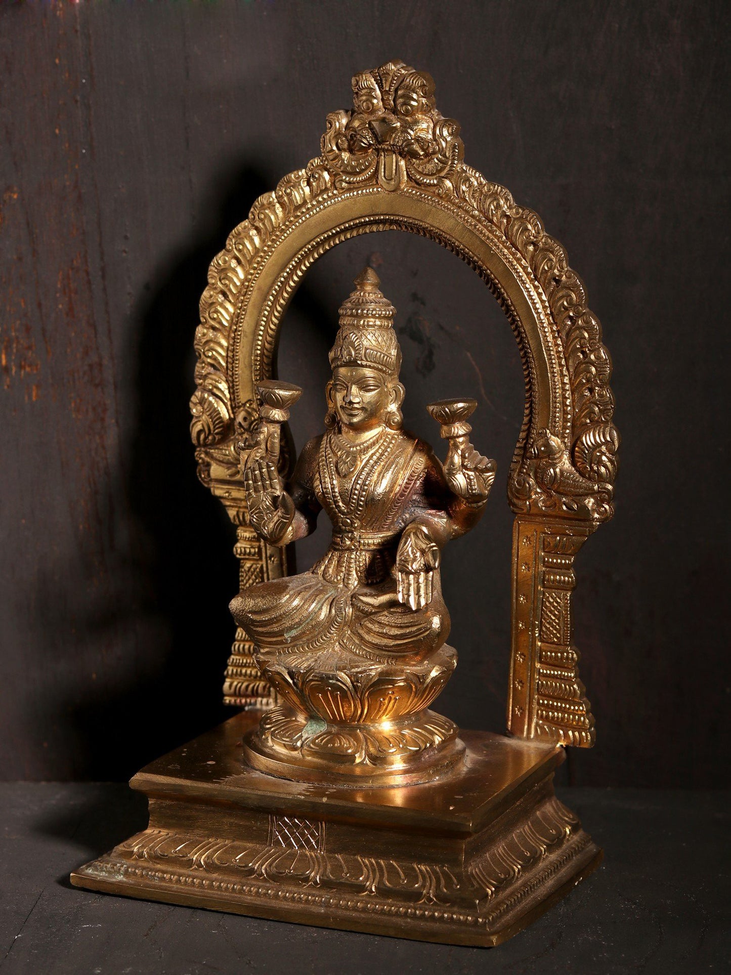 7" Bronze Goddess Lakshmi Idol Seated on Lotus with Kirtimukha Arch | Bronze Statue